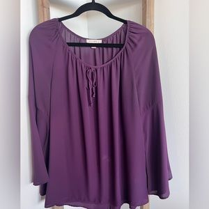Roz and Ali long sleeve plum colored blouse.
